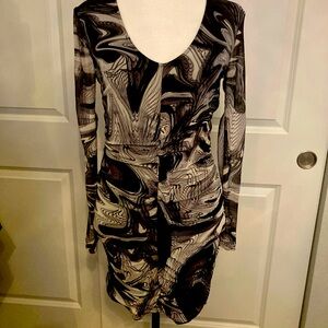 Steve Madden  dress. Spandex in dress. Rooshing down the front and back center!